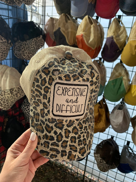 EXPENSIVE AND DIFFICULT HAT