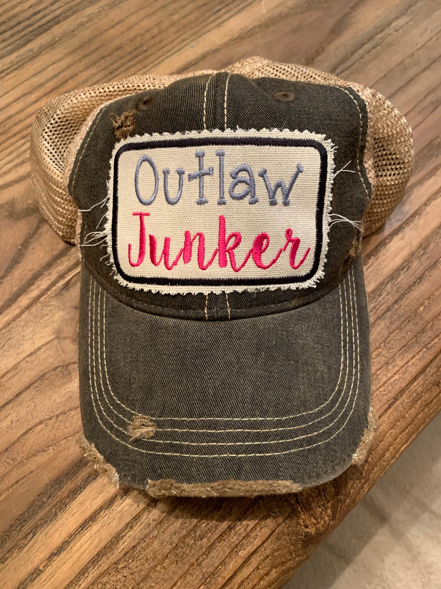 Outlaw Junker on black vintage distressed hat