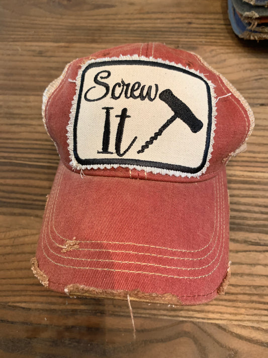 Screw it with wine cork on burgundy vintage hat