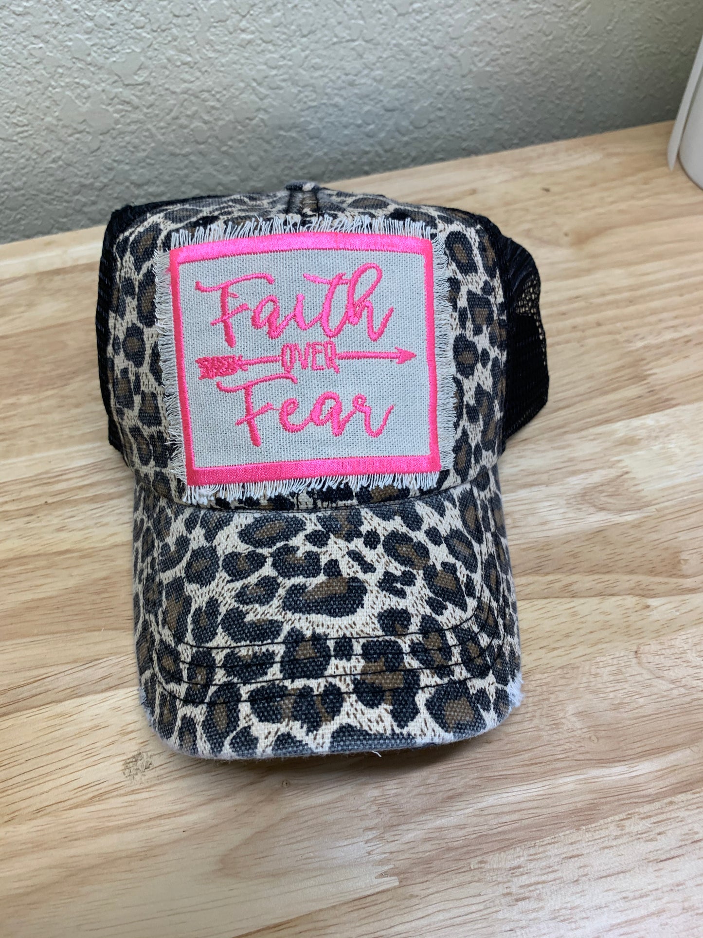 Faith over Fear distressed leopard hat with hot pink stitching